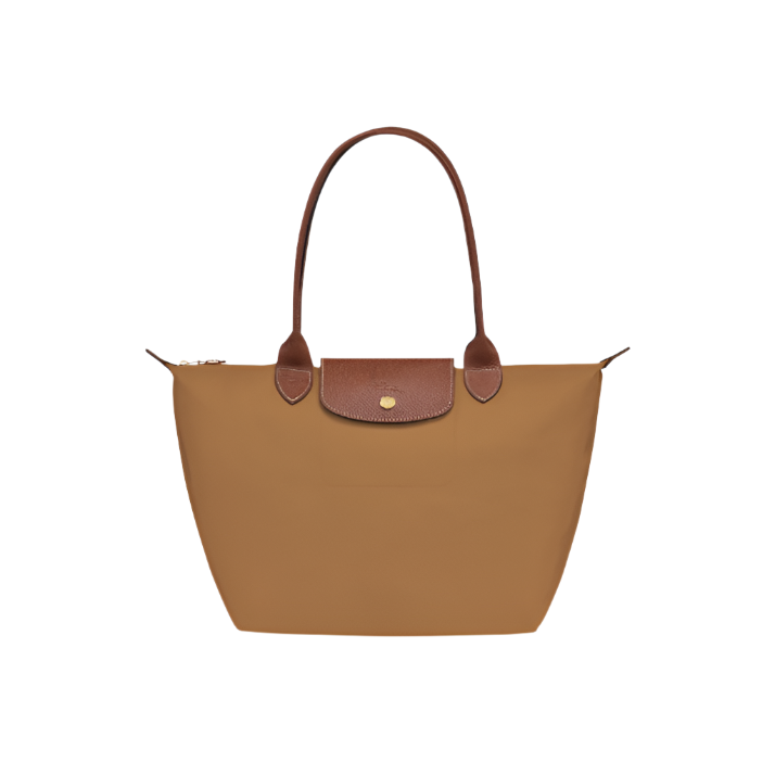 Brown handbag with brown handle and clasp on a light gray background- brown purse