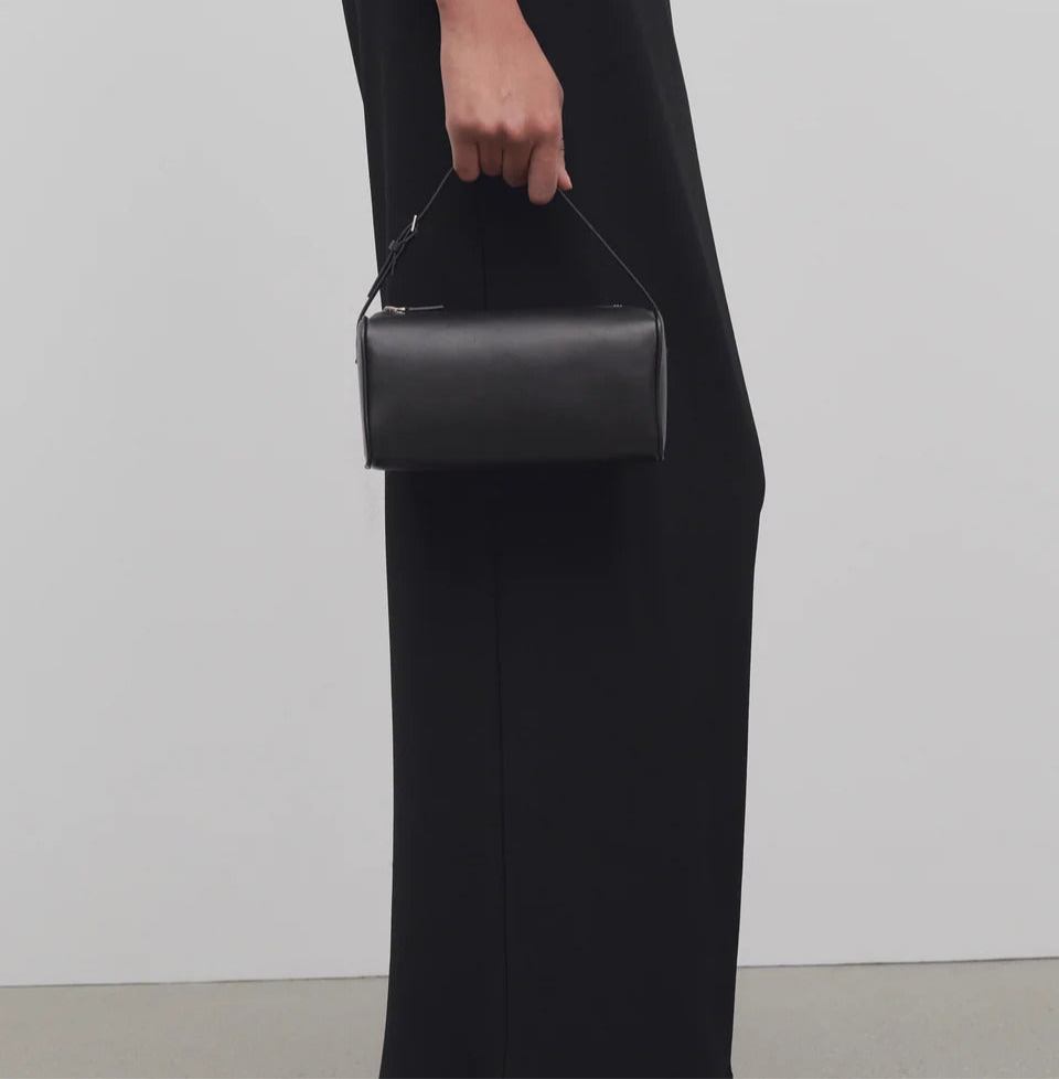 90s leather handbag- black purse model holding