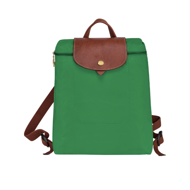 Green longchamp backpack with brown leather accents on a white background