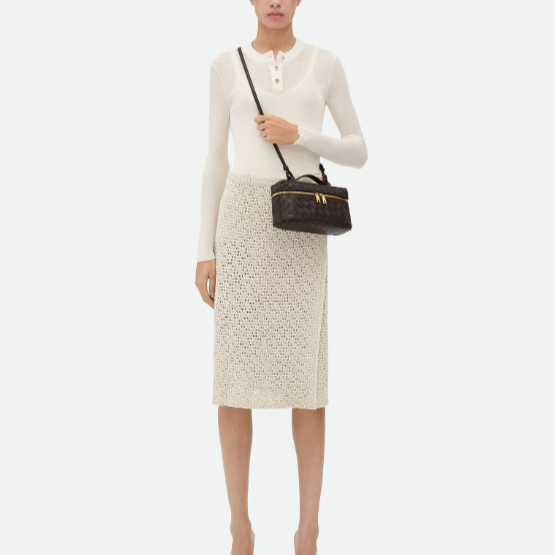 celia handbag- black purse model holding