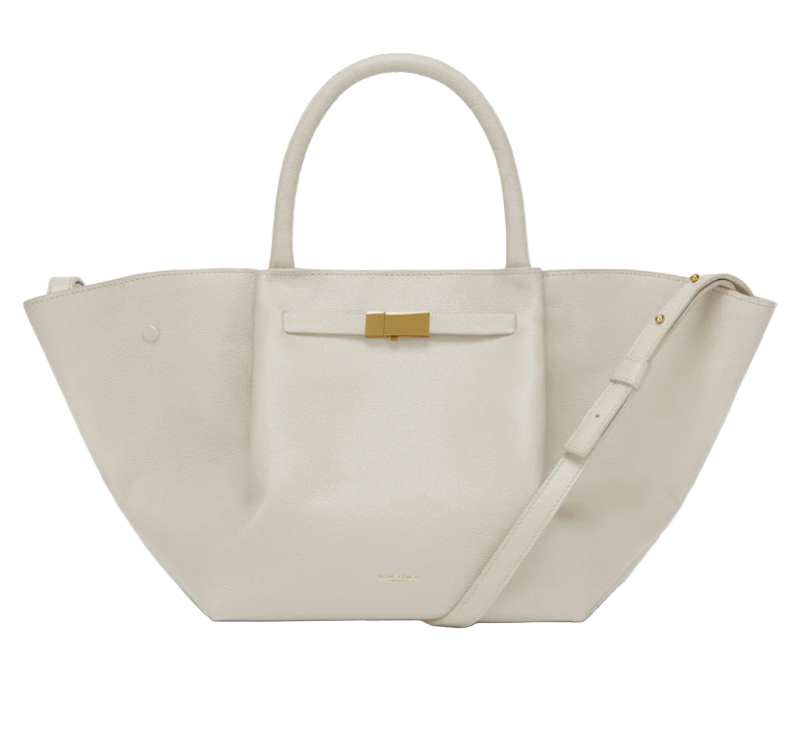 White leather midi luxury handbag with a strap on a white background