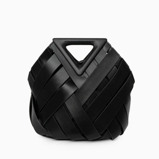 Black veya handbag on a white background