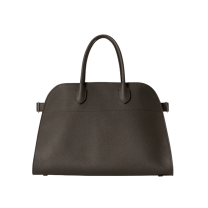 Dark brown leather handbag on a light gray background