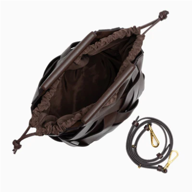 Brown drawstring bag with a black helmet and a black lanyard on a white background
